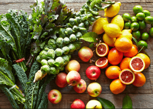 a group of fruits and vegetables on a wood surface Healthy Weight Loss Diets Tewkesbury